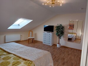 2 habitaciones, tabla de planchar con plancha y cuna de viaje