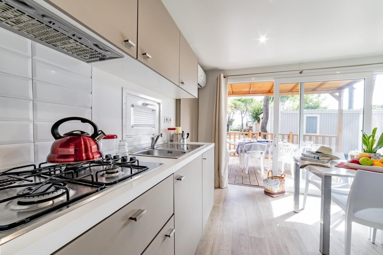 Fridge, stovetop, coffee/tea maker, highchair