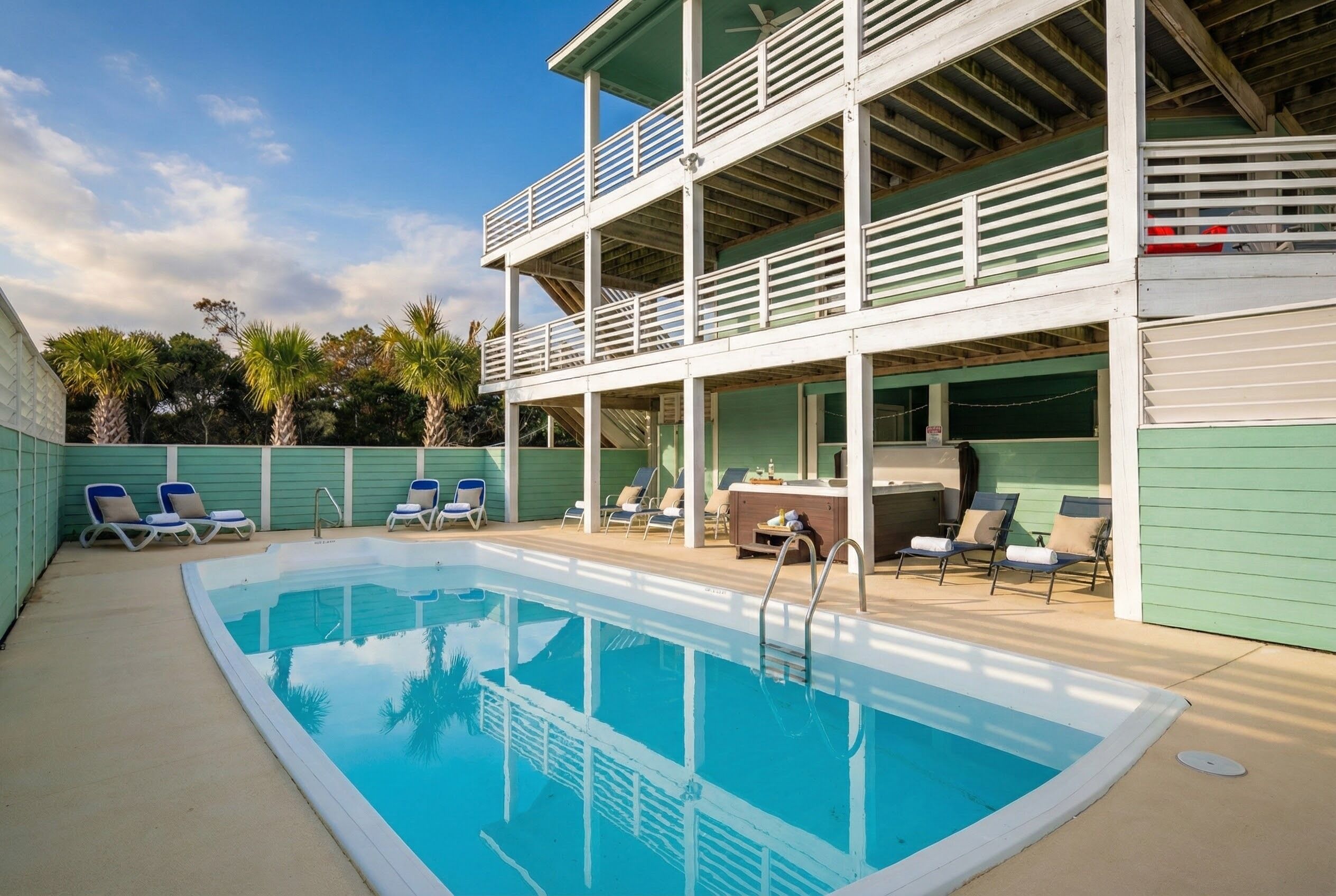 Shaded Luxury – The Perfect Poolside Lounge.