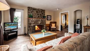 Chalet, 2 Bedrooms | Living area | 32-inch flat-screen TV with cable channels, fireplace