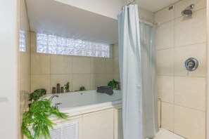 Jetted tub, hair dryer, towels, soap