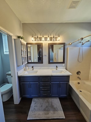 Hair dryer, towels, soap, toilet paper