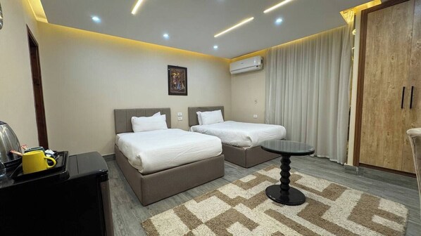 2 bedrooms, desk, iron/ironing board, travel cot