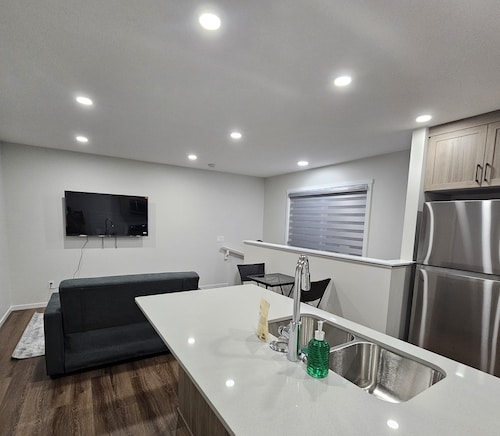 Modern 1-Bedroom Garden Suite | Above Ground Suite | Side Parking | Chappelle