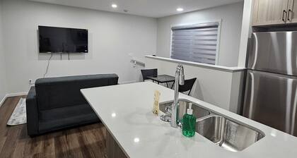 Modern 1-Bedroom Garden Suite | Above Ground Suite | Side Parking | Chappelle