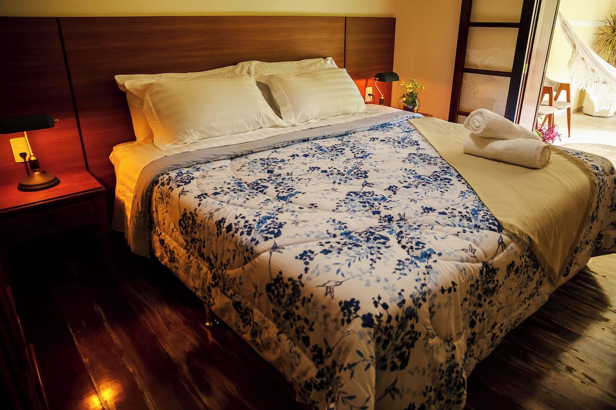 Suite Deluxe, vista al jardín | 1 habitación, escritorio y wifi gratis