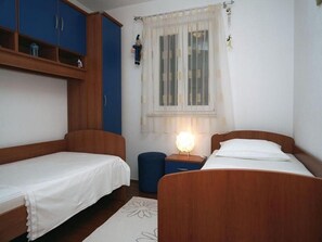 2 dormitorios, tabla de planchar con plancha, Internet y ropa de cama