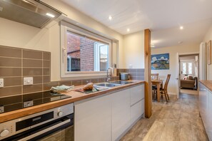 Fridge, microwave, oven, cookware/dishes/utensils