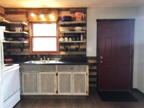 Fridge, microwave, oven, stovetop - Lakeside Cabin | Calm Waters Resort | Boat Slips & Rentals | FREE Kayaks & Paddleboards | Guided Fishing & Lake Tours! (Branson)