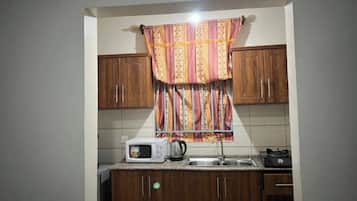 Fridge, microwave, oven, electric kettle