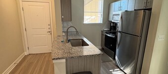 Cozy apartment in welcoming Cedar Park with WiFi, AC, fitness room
