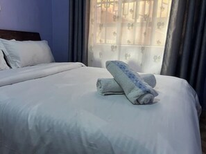 2 chambres, fer et planche à repasser, Wi-Fi, draps fournis