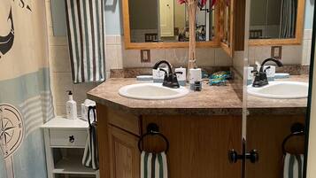 Hair dryer, towels, soap, toilet paper