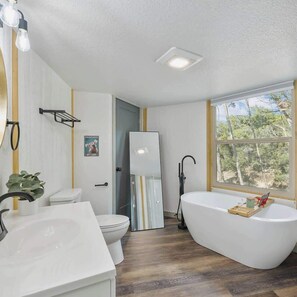 Shower, hair dryer, towels, shampoo