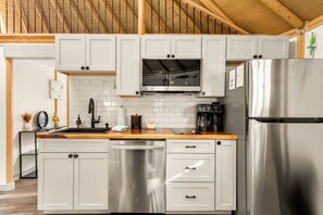 Fridge, microwave, oven, stovetop - Bronco • Modern Yurt‑Cabin w/ Hot Tub + Swings (Canyon Lake)