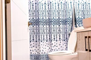 Hair dryer, towels, soap, toilet paper