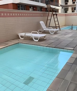 Outdoor pool, pool umbrellas, pool loungers
