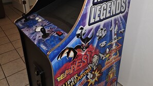 A video game arcade machine with the title "Arcade Legends" and "Asteroids" game displayed. - St. Lucie Breezes 2 (Palm City)