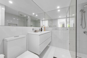 Shower, hair dryer, towels, soap