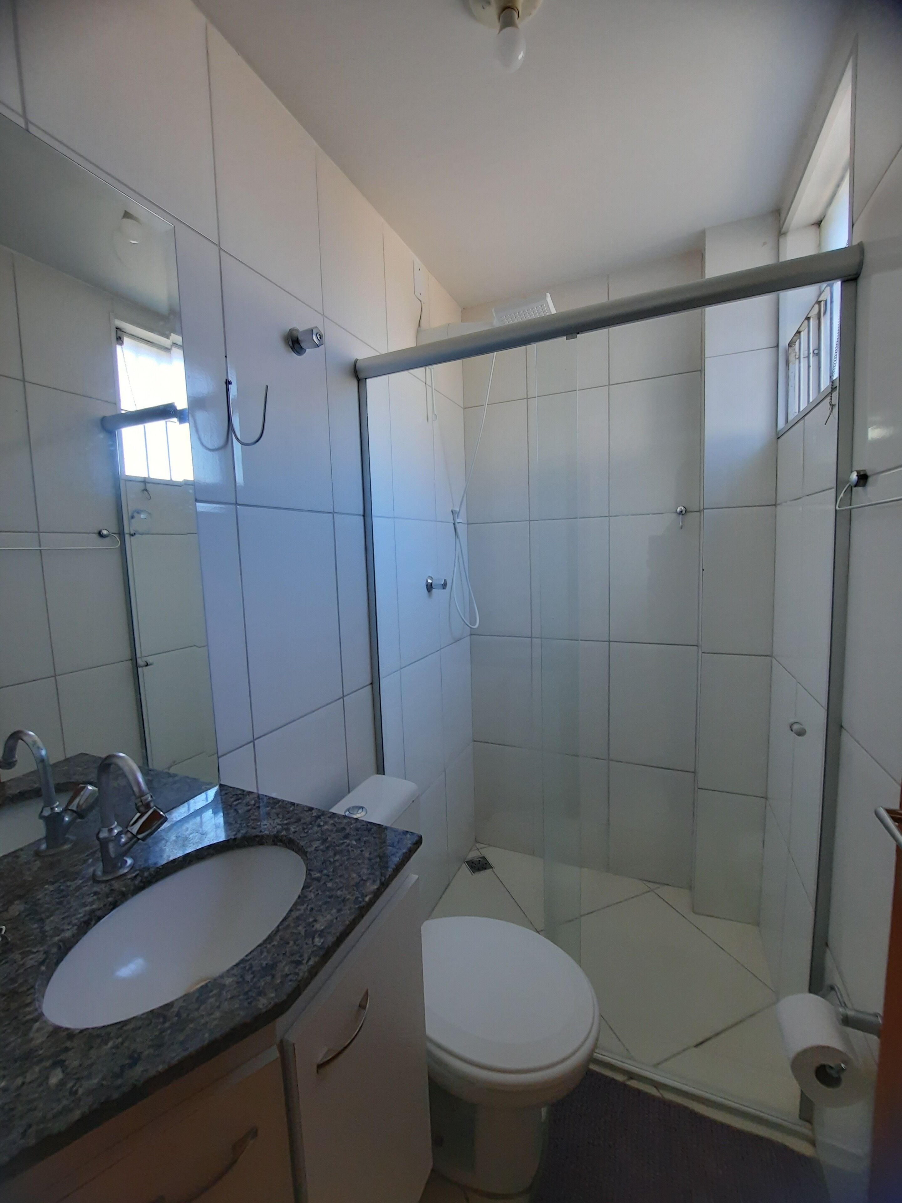 Shower, towels, soap, toilet paper