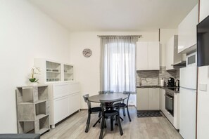 Fridge, microwave, oven, stovetop - GuestHost - St. James District Modern Apartment (Trieste)