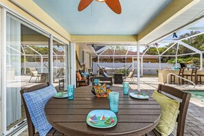Outdoor dining - Adventure Awaits, Heated Pool & hot Tub - Cowboy Cabana - Roelens (Cape Coral)