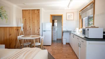 Fridge, microwave, toaster, cookware/dishes/utensils