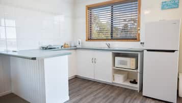 Fridge, microwave, toaster, cookware/dishes/utensils