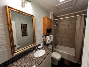 Hair dryer, towels, soap, shampoo