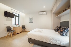 1 غرفة نوم ومكواة/لوح كي وواي فاي مجانًا وملاءات أسرّة