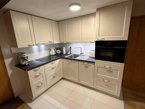 Fridge, dishwasher, cookware/dishes/utensils