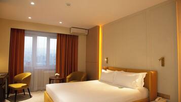 In-room safe, desk, laptop workspace, blackout curtains