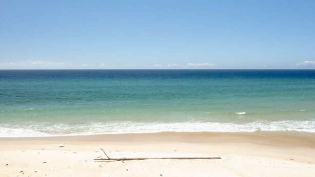 A beach with a clear sky and calm sea. - Etosha Villa @ Blue Seas (Scamander)