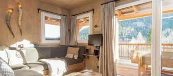 Spacious chalet in ski resort with outdoor sauna