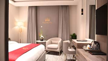 Minibar, coffres-forts dans les chambres, rideaux occultants