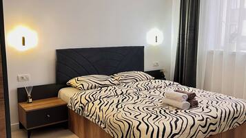 1 habitación, tabla de planchar con plancha, wifi gratis y ropa de cama