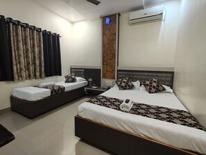 Deluxe Triple Room | Soundproofing, free WiFi - sai balaji residency (Rahata)