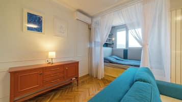 Studio, Multiple Bedrooms, Balcony, City View | Living room