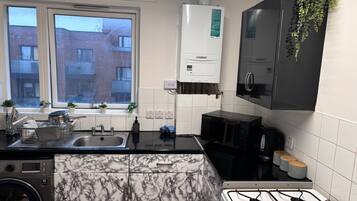 Apartment | Private kitchen | Fridge, microwave, oven, stovetop