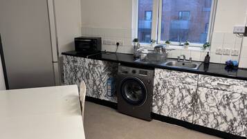 Apartment | Private kitchen | Fridge, microwave, oven, stovetop
