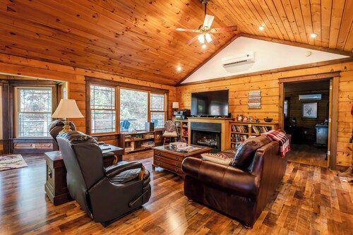 Escape to our cozy lakeview cabin with modern amenities, spacious decks and serene surroundinngs.