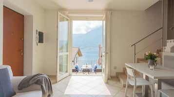 Apartment (1 Bedroom) | Living area | 32-inch Smart TV with cable channels