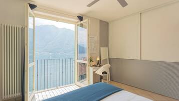 Apartamento (1 Bedroom) | 1 quarto, espaço de trabalho para notebook, roupa de cama