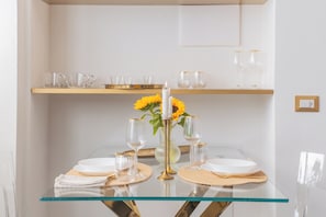 Apartment (Gold Suite) | Living area | 32-inch flat-screen TV with cable channels