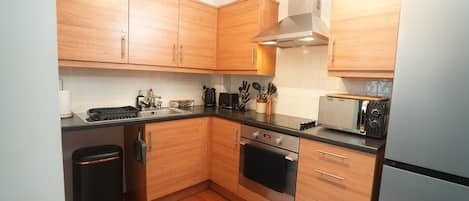 Apartment | Private kitchen | Fridge, microwave, oven, stovetop