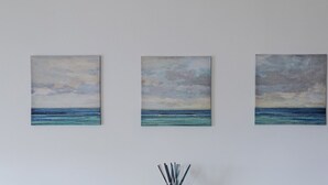 Three paintings of a seascape on a plain wall. - Casa Bianca a Bogliasco by Wonderful Italy (Bogliasco)