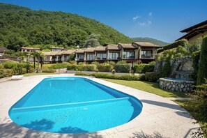 Departamento, 3 habitaciones, balcón, vista al lago | Alberca | Alberca al aire libre 