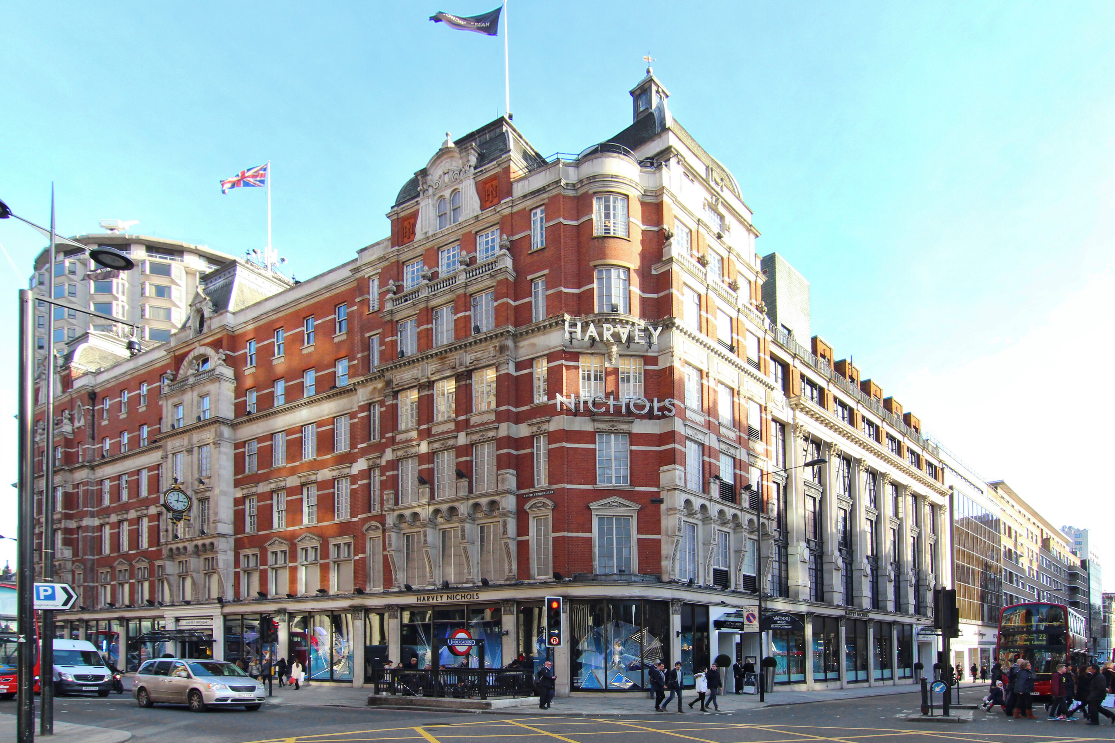 A historic building with the name "Harvey Nichols" prominently displayed.