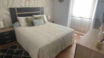 2 bedrooms, in-room safe, iron/ironing board, travel cot