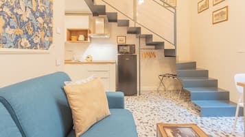 Apartment (Demetra) | Living area | 32-inch flat-screen TV with cable channels